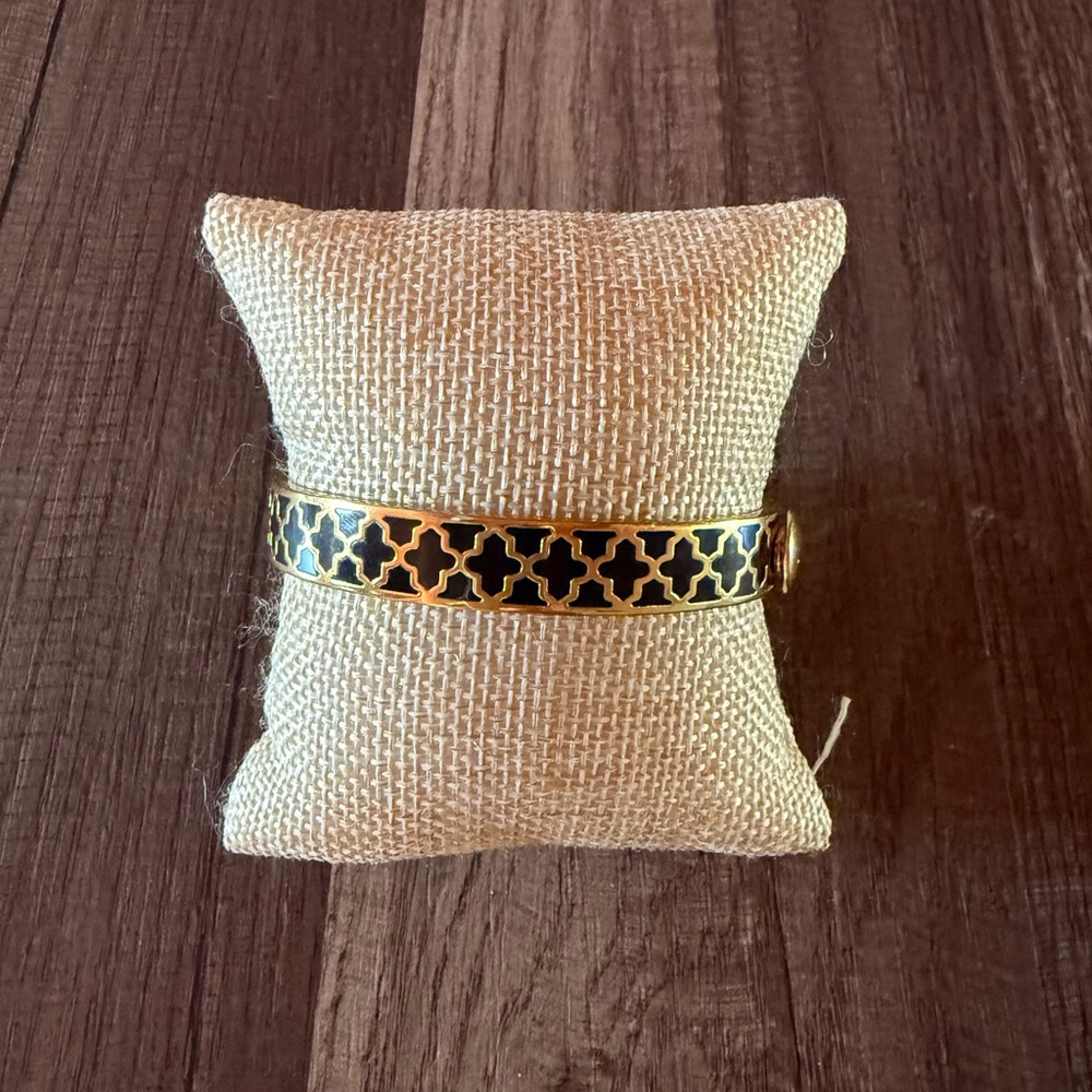 Halcyon Days black and gold bangle.